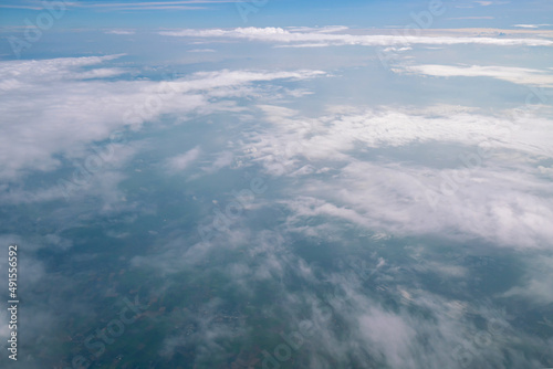 Blue sky and Clouds as seen through window of aircraft © CasanoWa Stutio