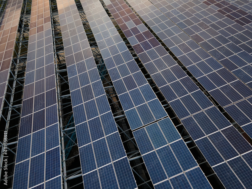 Looking down at solar panels in the twilight Looking down at solar panels in the twilight