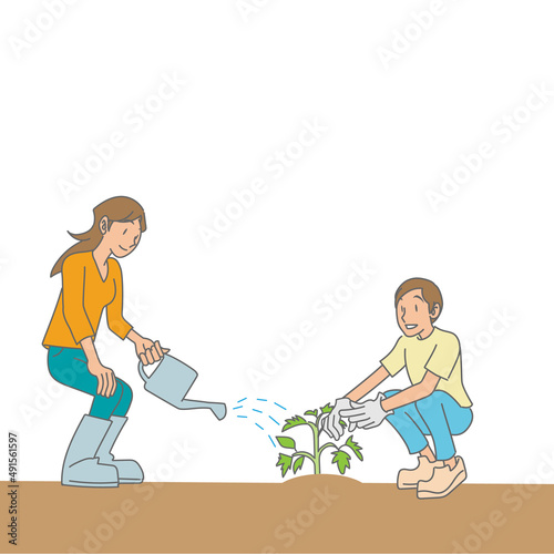 野菜の苗を植える夫婦