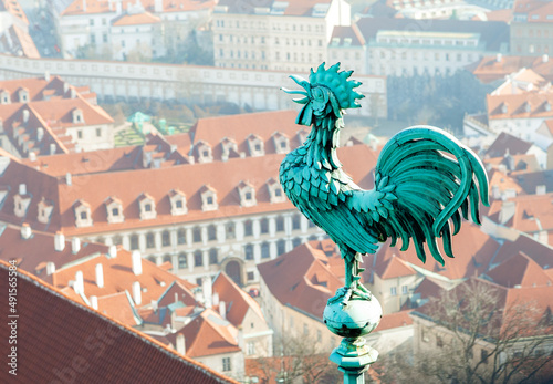 Bronze weathercock at the roof of St Vitus' Cathedral, Prague Castle photo