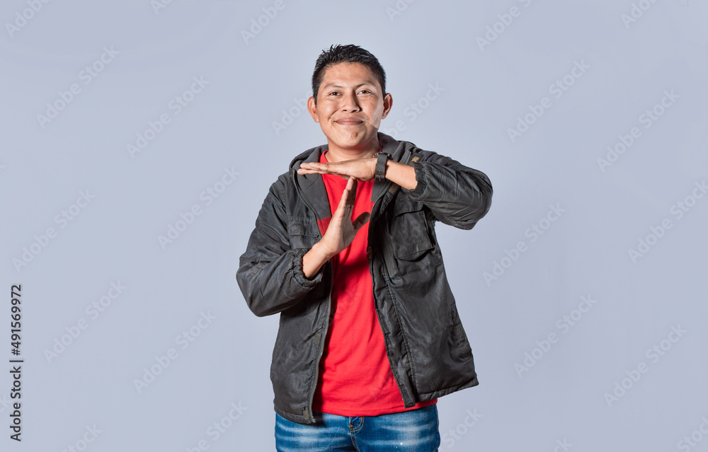Man making time out gesture, latin guy making time out gesture Man making time out gesture, latin guy making time out gesture