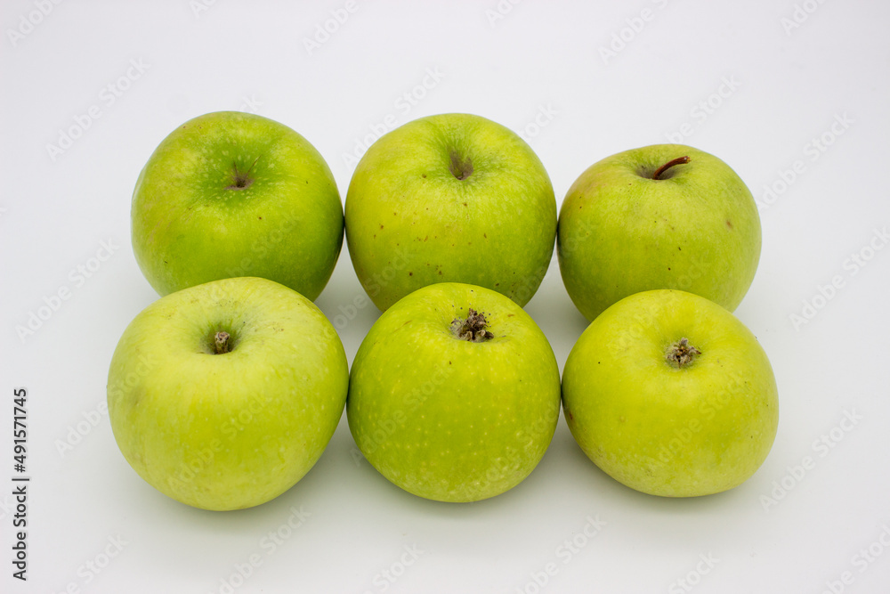 Few green apples on white background Few green apples on white background