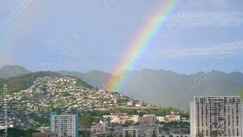 Beautiful rainbow above Honolulu Hawaii in 4k slow motion 60fps photo