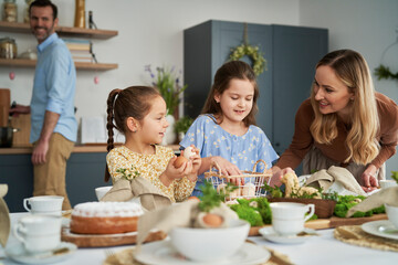 Caucasian family about to start an easter dinner at home