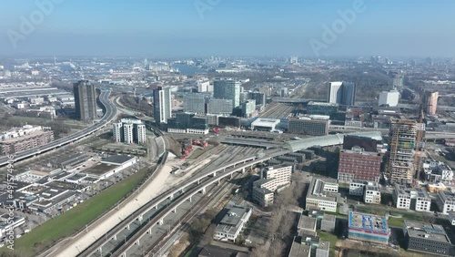 Wallpaper Mural Railway station transportation infrastructure metro train station in Amsterdam Sloterdijk, The Netherlands. Aerial of highway urban transit platform and office buildings skyline. Torontodigital.ca