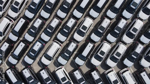 Market of new cars in Vladivostok. Customs cleared cars in the port. View from above. New cars.