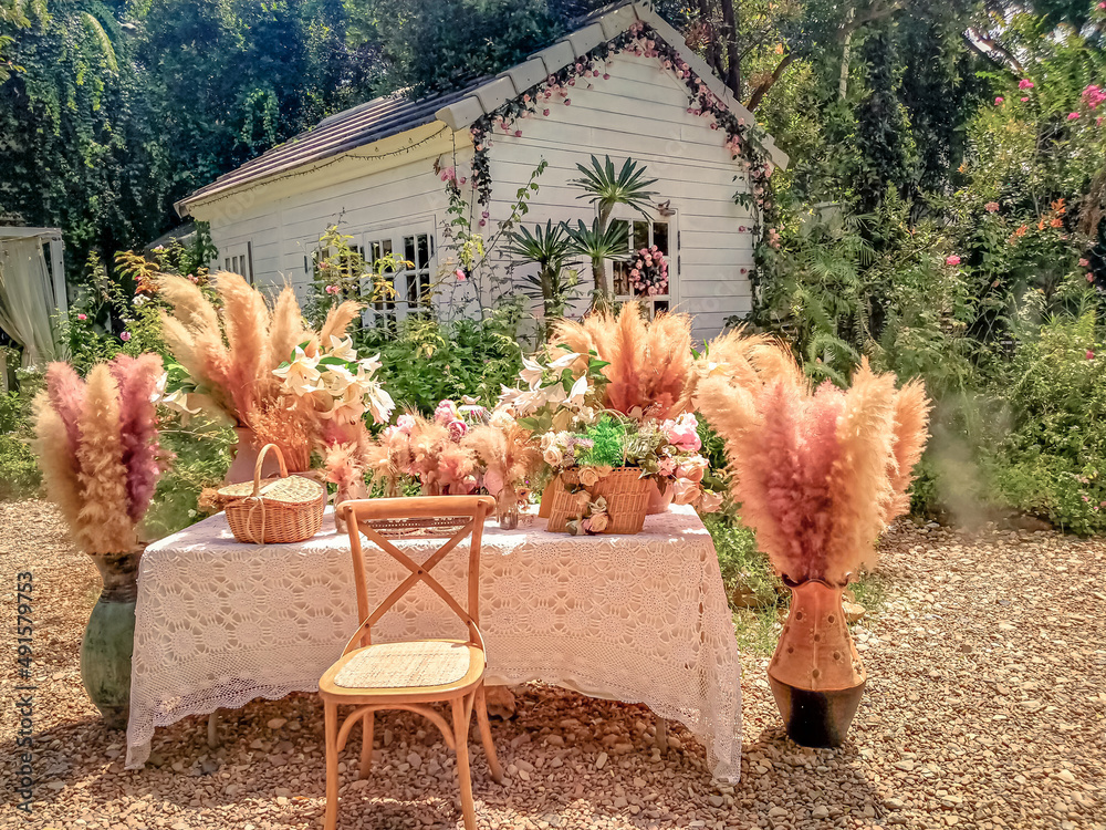 Fototapeta premium Garden cottage with beautiful blooms flower Homesthetics house idea 