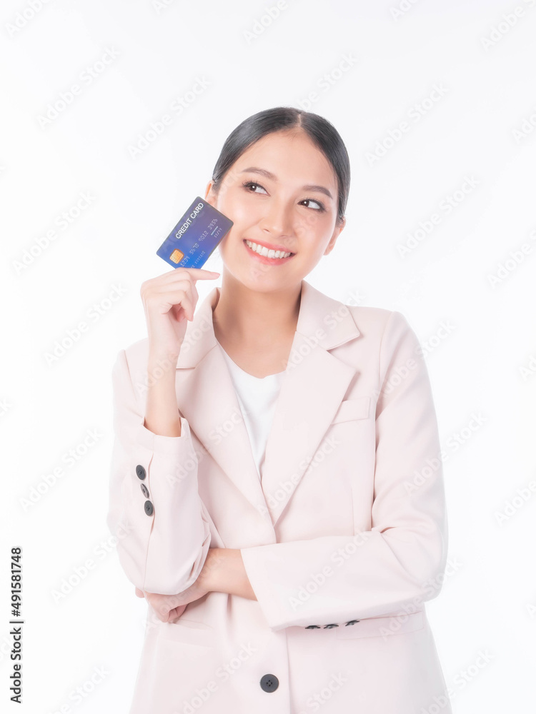 Business Asian woman showing credit card for payment shopping online , paying by credit card online shopping e-commerce telemarketing concept Business Asian woman showing credit card for payment shopping online , paying by credit card online shopping e-commerce telemarketing concept