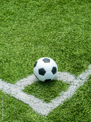 soccer Football on Corner kick line of ball and a soccer field , football field , background texture