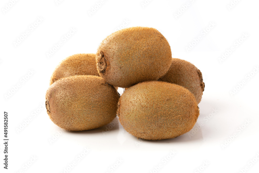 Ripe whole kiwi fruits isolated on a white background Ripe whole kiwi fruits isolated on a white background