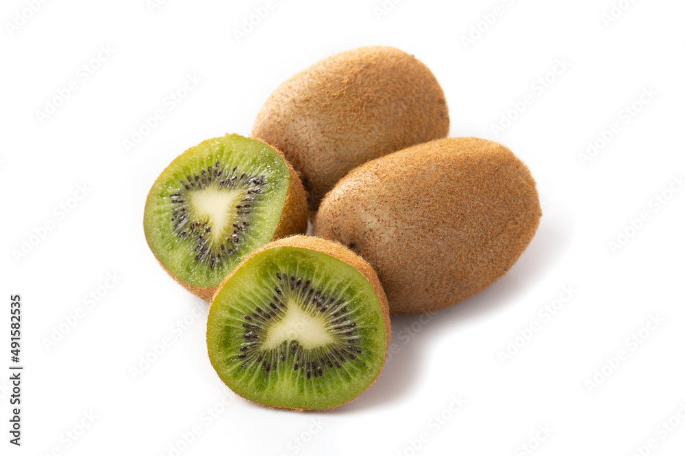 Ripe kiwi fruit and half kiwi isolated on a white background Ripe kiwi fruit and half kiwi isolated on a white background