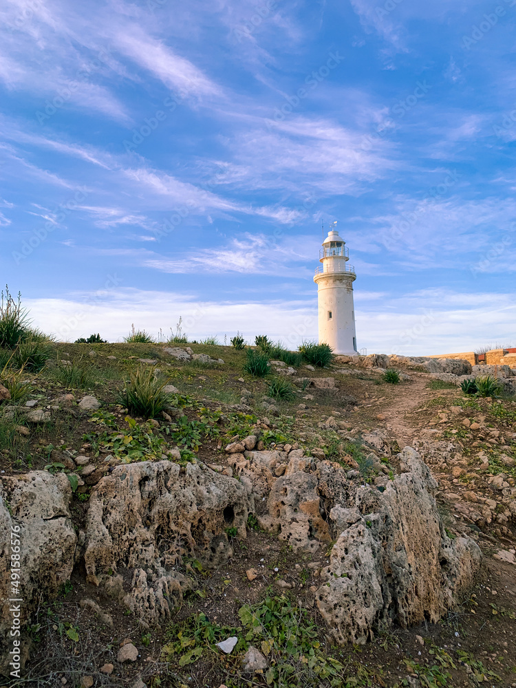 White lighthouse in the idyllic landscape