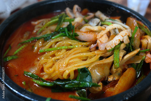 A Chinese-style Korean dish boiled with chicken or pork bone broth stir-fried vegetables, pork, and seafood in oil.