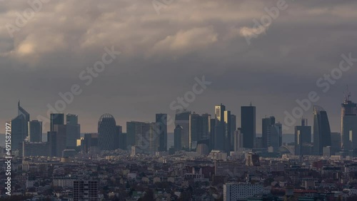 La Defense Business District Under Stormy Clouds With Sunlight on Towers Paris
