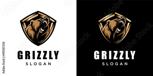 Grizzly Bear Head Animal Illustration Angry Strong Mascot with Shield Security Symbol Vector Logo Design