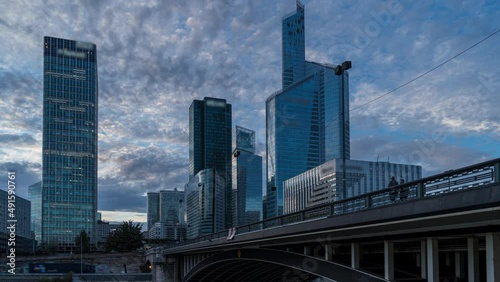 Cloudy Sunset Over La Defense Business District Paris Seine River and Bridge Buildings and Towers
