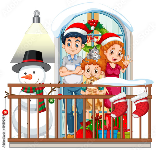 Family in Christmas theme standing on the balcony