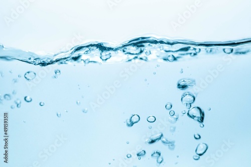 Soft focus cosmetic moisturizer water toner or emulsion blue oxygen moisture abstract background 