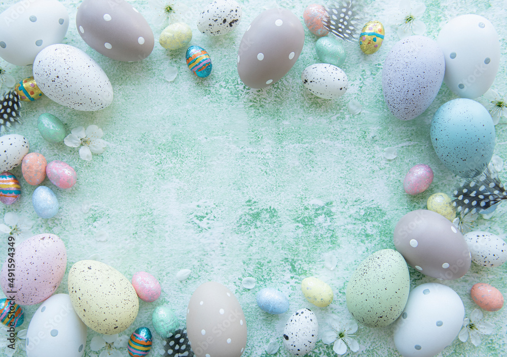 Colorful Easter eggs on green wooden background Colorful Easter eggs on green wooden background