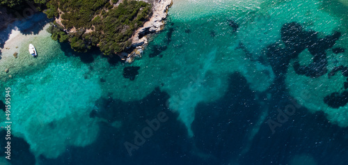 Coast as a background from top view. Turquoise water background from top view. Summer seascape from air. © Angelov