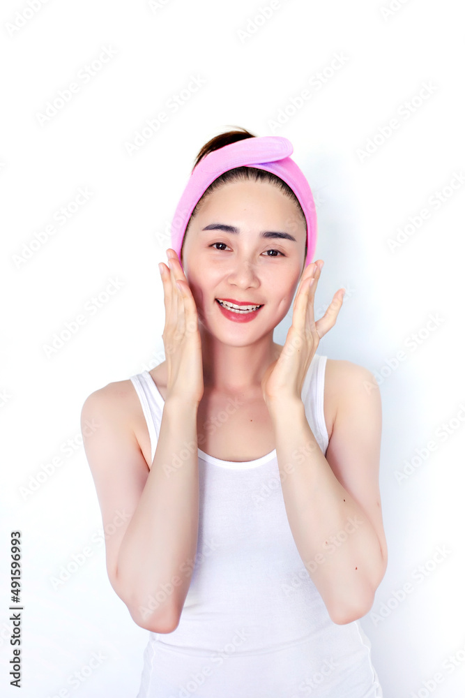 asian woman cleansing face and treatment skin with on white isolated asian woman cleansing face and treatment skin with on white isolated