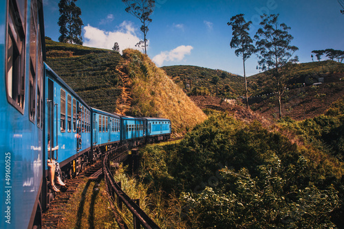 train from Nuwara Eliya to Kandy among tea plantations in the highlands of Sri Lanka photo