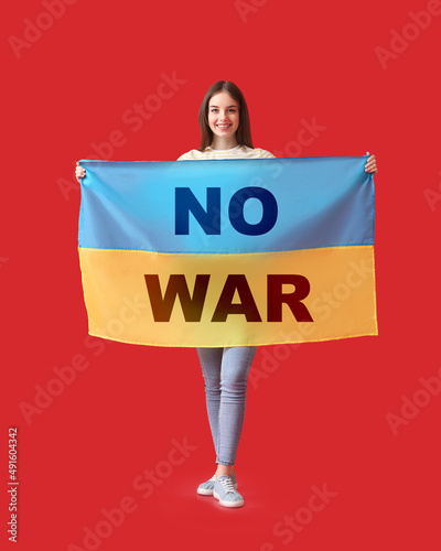 Young woman holding Ukraini...