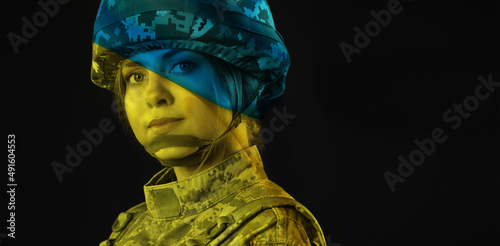 Young female soldier in col...