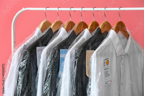Rack with clean clothes in ...