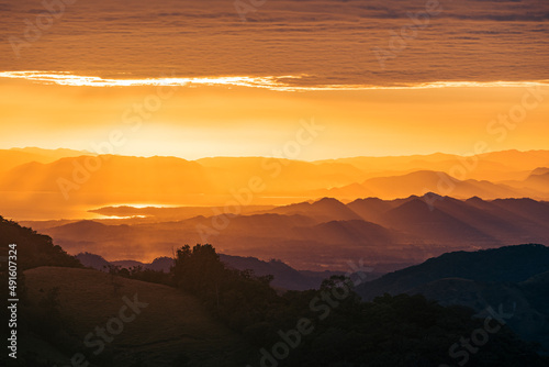 Beautiful landscape taken from the mountains of Monteverde in cCosta Rica, a cloudy day with beautiful rays of sunshine
