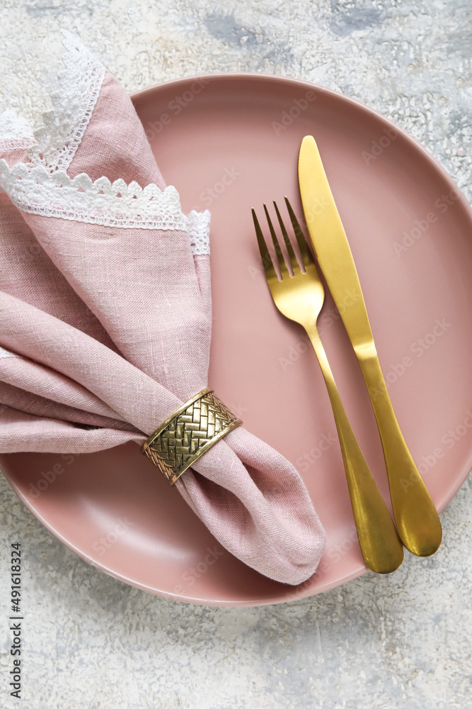 Simple beautiful table setting on light background Simple beautiful table setting on light background