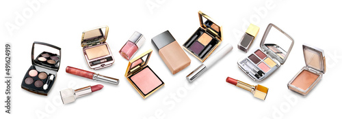Tableau sur toile Horizontal set of makeup goods against white background with a soft shadow
