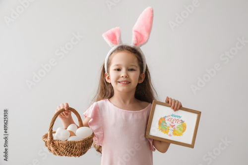 Cute little girl with bunny...