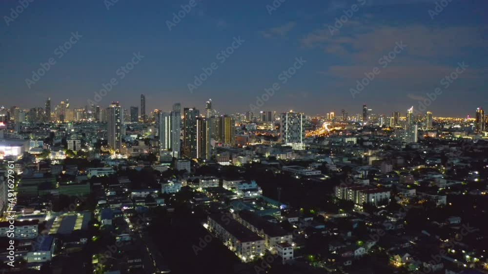 Aerial view of highway street road at Bangkok Downtown Skyline, Thailand. Financial district and business centers in smart urban city in Asia. Skyscraper and high-rise buildings at night. Aerial view of highway street road at Bangkok Downtown Skyline, Thailand. Financial district and business centers in smart urban city in Asia. Skyscraper and high-rise buildings at night.
