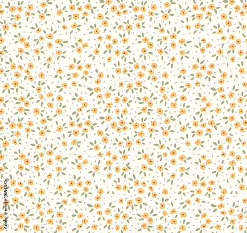 Vector seamless pattern. Pretty pattern in small flowers. Small yellow flowers. White background. Ditsy floral background. The elegant the template for fashion prints. Stock vector.