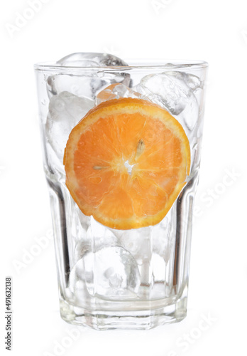 Fototapeta Naklejka Na Ścianę i Meble -  ice in glass empty white slice orange fruit isolated on white background clipping path