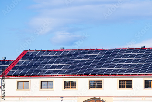 photovoltaic panels on the red roof
