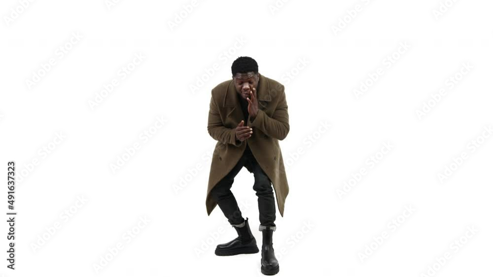 black guy modeling looking at his shoes white background - full shot. High quality 4k footage