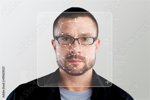 Quadro su tela Serious business person and smart technology for face recognition, double exposure