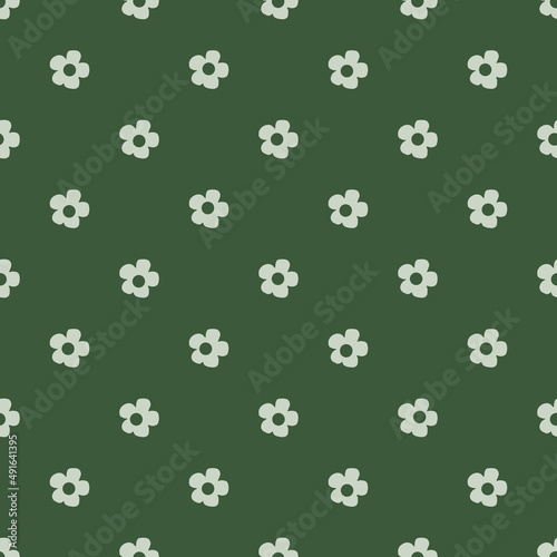 Flowers small cute in a flat style on a green background seamless. natural herbal flowers and birds decorate vector collection for fabric project or design element. Eco-friendly, nature doodle