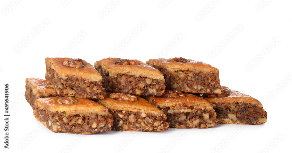 Delicious honey baklava with walnuts on white background Delicious honey baklava with walnuts on white background