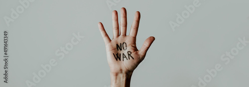 text no war written in a hand, web banner