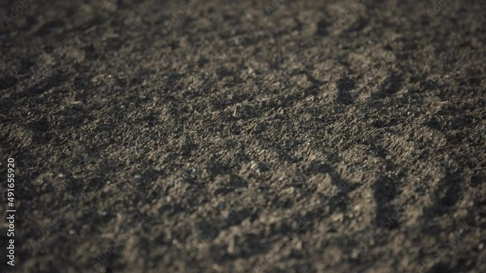 Natural Organic Soil Agriculture. Start of the sowing season. New plowed field at spring. Loop footage. Natural Organic Soil Agriculture. Start of the sowing season. New plowed field at spring. Loop footage.