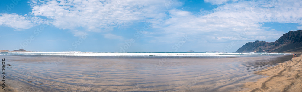 Panoramic Famara beach surf point landscape view, Lanzarote, Canary Islands, Spain