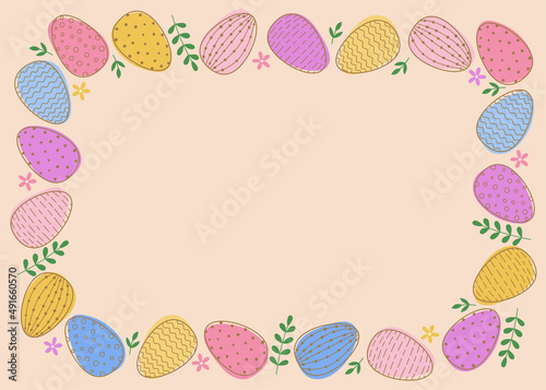 Rectangular frame of easter decorated eggs and leaves. Colorful eggs on pink background.
