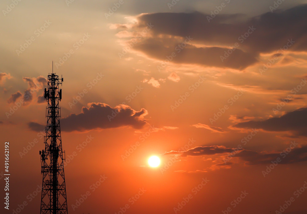 Transmission tower with sunset in the evening, wide of sunset view, signal tower, telecommunication