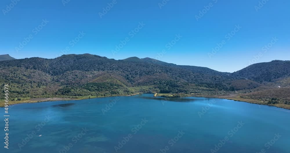 Float over Lake Rotoaira water foul boat hills landscape - New Zealand Float over Lake Rotoaira water foul boat hills landscape - New Zealand