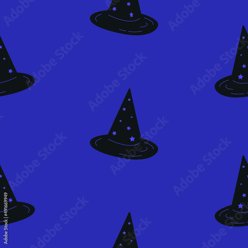 Witch hats vector seamless pattern. Halloween season caps on purple background for textile, fabric, wrapping paper design