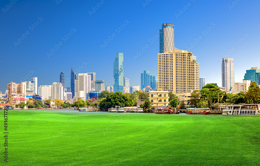 Cityscape office building with modern corporate architecture - business ideas and success. Panoramic skyline and modern business office buildings. green lawn with modern building