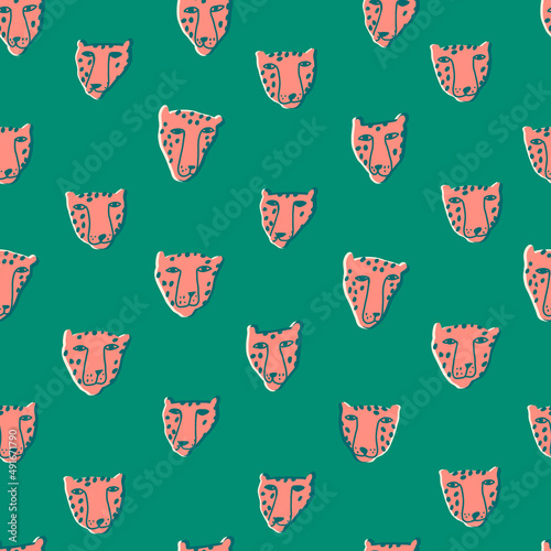 PrintPanther or cheetah funny heads seamless pattern. Cats contemporary repeat print. Isolated animals heads on the green background.